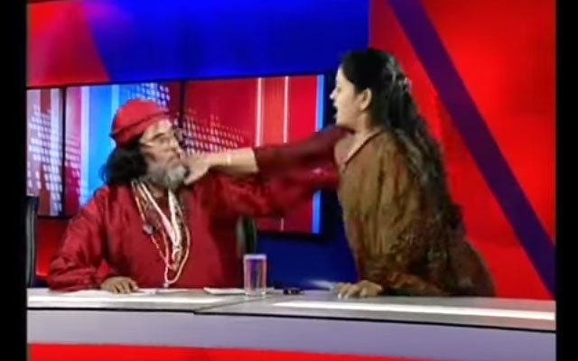 Lady astrologer and Baba slap each other silly on live TV