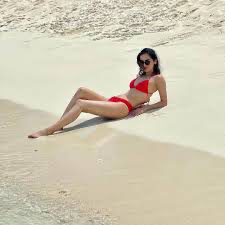 Manushi Chhillar Sizzles in Red Bikini: Former Miss World's Beachside Escapade